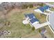 Beautiful aerial view of house with a concrete patio surrounded by green space and lush landscaping at 19041 Karyn Ln, Westfield, IN 46062
