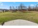 Large backyard featuring a concrete patio and a playset at 19041 Karyn Ln, Westfield, IN 46062