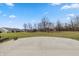 Spacious backyard featuring a concrete patio and a playset at 19041 Karyn Ln, Westfield, IN 46062