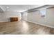 Finished basement with laminate floors, natural light, and door to the exterior at 19041 Karyn Ln, Westfield, IN 46062