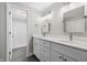 Bathroom featuring double sink vanity with quartz countertop and new lighting at 19041 Karyn Ln, Westfield, IN 46062