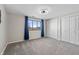 Bedroom with window and blue curtains for added style at 19041 Karyn Ln, Westfield, IN 46062