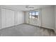 Bedroom with a window letting in natural light and two closets at 19041 Karyn Ln, Westfield, IN 46062