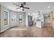 Sunlit dining area adjacent to kitchen, featuring stainless steel appliances and modern lighting at 19041 Karyn Ln, Westfield, IN 46062