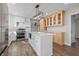 Modern kitchen with white cabinets, stainless steel appliances, and center island at 19041 Karyn Ln, Westfield, IN 46062