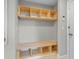 Mudroom with built-in wooden bench and cubbies for storage at 19041 Karyn Ln, Westfield, IN 46062