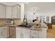 Granite countertops with a double basin sink and stainless steel dishwasher in kitchen at 226 N Cleveland St # 226E, Indianapolis, IN 46204