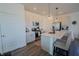 Modern kitchen with white cabinets, stainless steel appliances, and a large island with seating at 2349 Dixon Creek Dr, Whitestown, IN 46075