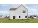 Spacious backyard featuring a well-manicured lawn and a modern white two-story home at 250 Evening Bay Ct, Pendleton, IN 46064