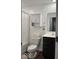 Clean bathroom featuring vanity with dark cabinets and shower-tub combo at 2536 Lanai Ln, Greenwood, IN 46143