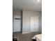 Bedroom featuring two doors: one entrance and one closet at 2536 Lanai Ln, Greenwood, IN 46143