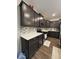 Well-lit kitchen featuring stainless steel appliances, attractive cabinets, and granite counters at 2536 Lanai Ln, Greenwood, IN 46143