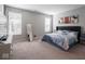 Spacious bedroom with carpet, neutral wall color, and a large bed creates a relaxing and comfortable retreat at 3252 Jasper Ln, Brownsburg, IN 46112