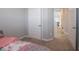 Carpeted bedroom featuring a closet door and doorway to the rest of the house at 3252 Jasper Ln, Brownsburg, IN 46112