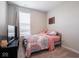 Cozy bedroom featuring soft carpet and neutral walls at 3252 Jasper Ln, Brownsburg, IN 46112