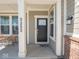Inviting front porch and door showcasing the entrance to a well maintained home at 3252 Jasper Ln, Brownsburg, IN 46112