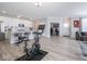 Open-concept kitchen with stainless steel appliances and modern features, seamlessly connecting to the living area at 3252 Jasper Ln, Brownsburg, IN 46112