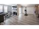 Spacious living room featuring a fireplace, sleek floors, and abundant natural light at 3252 Jasper Ln, Brownsburg, IN 46112