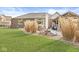 Large backyard featuring an outdoor patio with seating and a covered pergola perfect for relaxing or entertaining at 3342 Challenger Dr, Plainfield, IN 46168