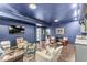Basement features comfortable seating, and a wet bar area for relaxation and entertaining guests at 3342 Challenger Dr, Plainfield, IN 46168