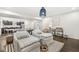 Finished basement with comfortable seating, wet bar, and dining area perfect for relaxing and hosting guests at 3342 Challenger Dr, Plainfield, IN 46168
