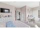 Inviting bedroom with soft pink walls, plush decor, and a vanity area, perfect for relaxation at 3342 Challenger Dr, Plainfield, IN 46168