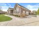 Stunning exterior with stone accents, a three-car garage, and manicured landscaping at 3342 Challenger Dr, Plainfield, IN 46168