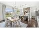 Open concept kitchen and dining area featuring a stone archway and a table with seating for six at 3342 Challenger Dr, Plainfield, IN 46168