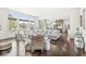 Bright and open living room with hardwood floors, lots of natural light, and an open kitchen at 3342 Challenger Dr, Plainfield, IN 46168