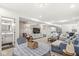 Large living space with a TV, multiple seating areas, and a seamless flow to other rooms at 3342 Challenger Dr, Plainfield, IN 46168