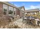 Inviting outdoor kitchen and dining area, featuring a built-in grill and a covered pergola with comfortable seating at 3342 Challenger Dr, Plainfield, IN 46168