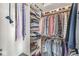 Well-organized walk-in closet featuring clothes, shoes, and accessories neatly arranged on shelves and rods at 3342 Challenger Dr, Plainfield, IN 46168