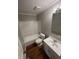 Well-lit bathroom featuring a bathtub, vanity, toilet, and tiled flooring for a clean and modern feel at 3830 Aloda St, Indianapolis, IN 46203