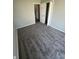 Neutral bedroom with carpeting and view to the living room at 3830 Aloda St, Indianapolis, IN 46203