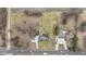 An overhead view capturing a house beside expansive fields, highlighting the property's tranquil and rural ambiance at 4251 W 176Th St, Sheridan, IN 46069