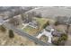 Aerial view featuring a house with a long driveway and a large lot, complemented by nearby wooded area at 4251 W 176Th St, Sheridan, IN 46069