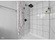 This bathroom features a shower stall with tiled walls, rainfall shower head, and a neutral shower curtain at 4407 Barnor Dr, Indianapolis, IN 46226