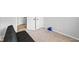 Bedroom showing carpet, neutral walls, stack of disks, and black futon at 4407 Barnor Dr, Indianapolis, IN 46226