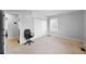 Bedroom showcases neutral carpet, window, closet, and a black chair at 4407 Barnor Dr, Indianapolis, IN 46226