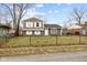 Charming two-story home featuring new windows, modern exterior, and a well-maintained lawn at 4407 Barnor Dr, Indianapolis, IN 46226