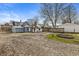 Expansive backyard featuring a detached shed and a fire pit at 524 S State St, Greenfield, IN 46140