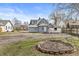 Spacious backyard featuring a fire pit at 524 S State St, Greenfield, IN 46140