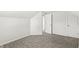 Cozy bedroom with neutral carpet, ready for personalization and decor at 524 S State St, Greenfield, IN 46140