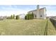 Well-maintained backyard with mature trees and view of neighborhood homes at 5806 Belvista Dr, Plainfield, IN 46168
