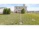 A view of backyard featuring the lawn, trees, and home exterior at 5806 Belvista Dr, Plainfield, IN 46168