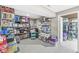 Basement storage area featuring metal shelves filled with boxes and storage containers at 5806 Belvista Dr, Plainfield, IN 46168
