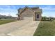 Beautiful home with a brick front, well-manicured lawn, and convenient two-car garage at 5806 Belvista Dr, Plainfield, IN 46168