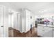 Hallway leading to an open-concept living area with great flow between the kitchen and living spaces at 5806 Belvista Dr, Plainfield, IN 46168