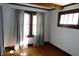 Bedroom featuring natural light from two windows with decorative curtains at 6041 Dewey Ave, Indianapolis, IN 46219