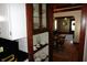 View of dining room with hardwood floors and view of front entry at 6041 Dewey Ave, Indianapolis, IN 46219